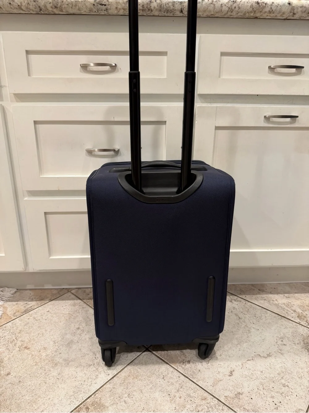 Tumi Navy Softside Carry-On Spinner